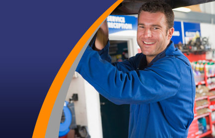 Mechanic working on a car, covered by the Motor Codes